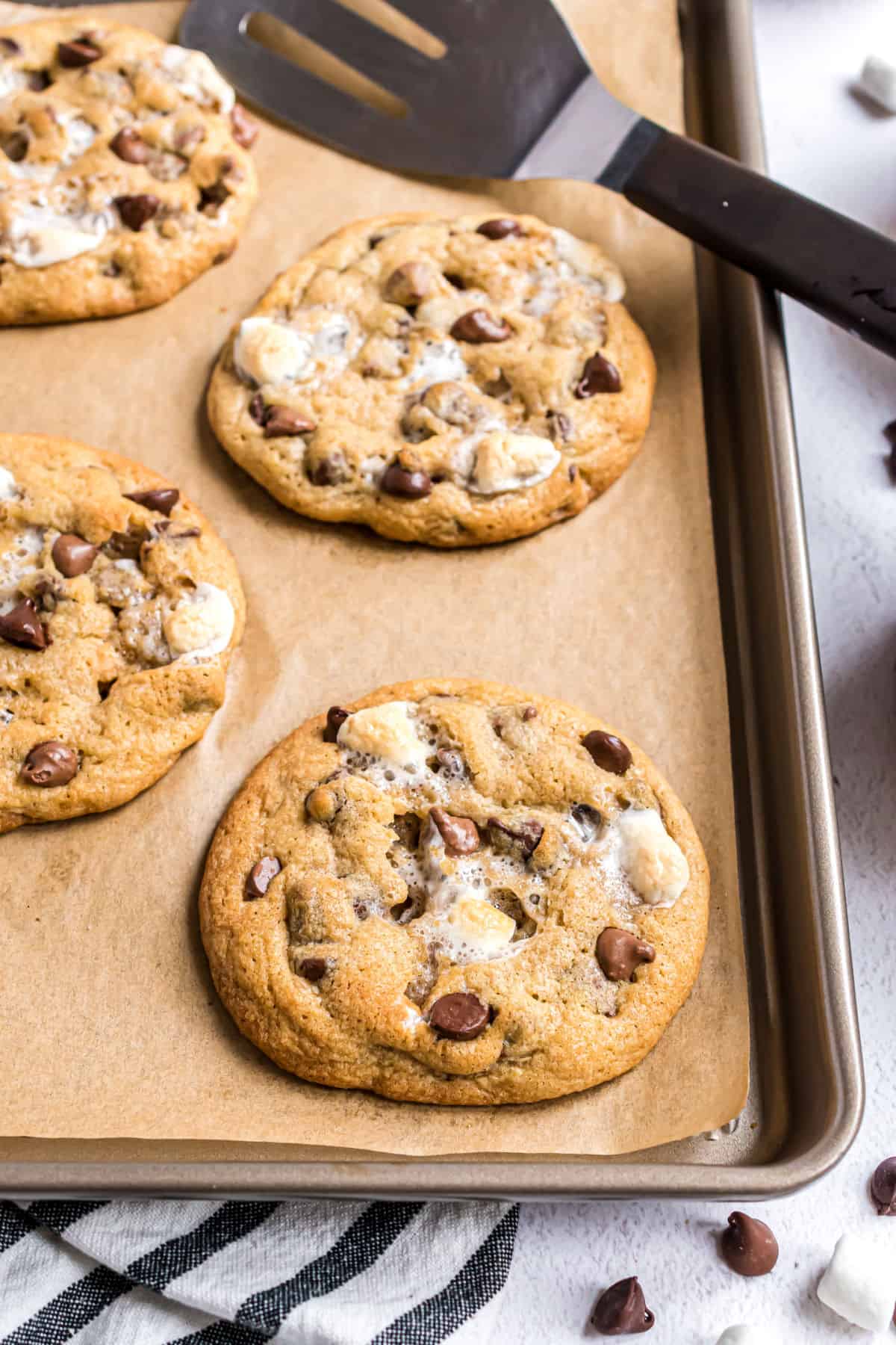 S'mores cookies cooling on parchment paper.