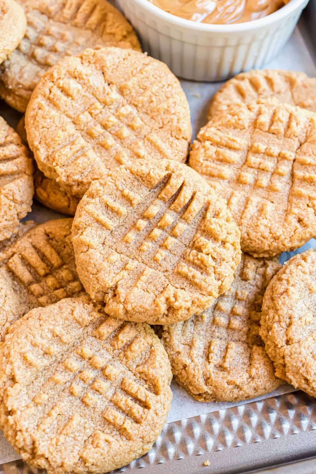 Peanut butter cookies served in a stack.