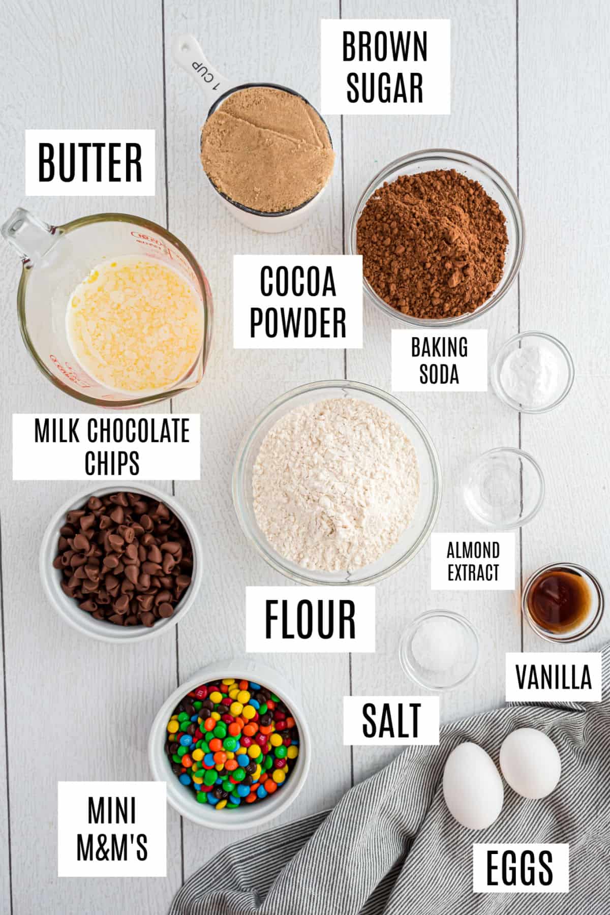 Ingredients needed to make chocolate m&ms cookies.