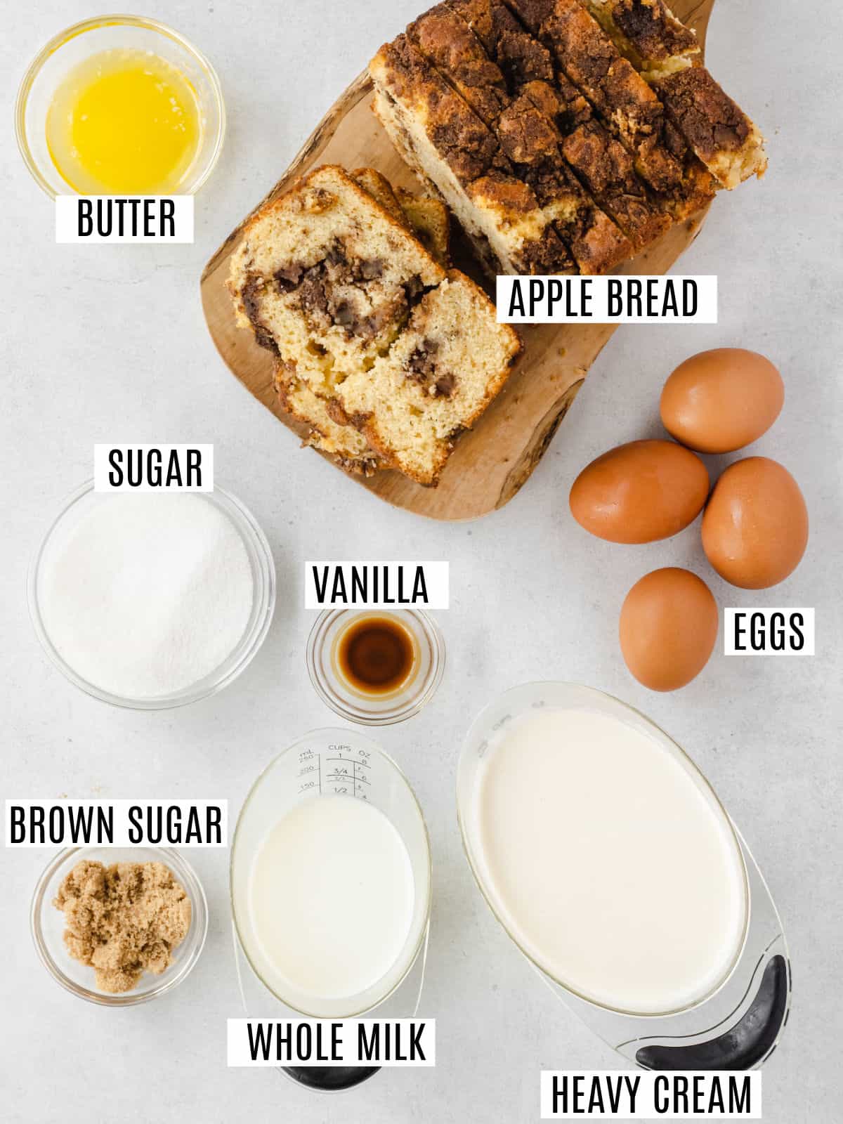 Ingredients needed to make apple bread pudding.