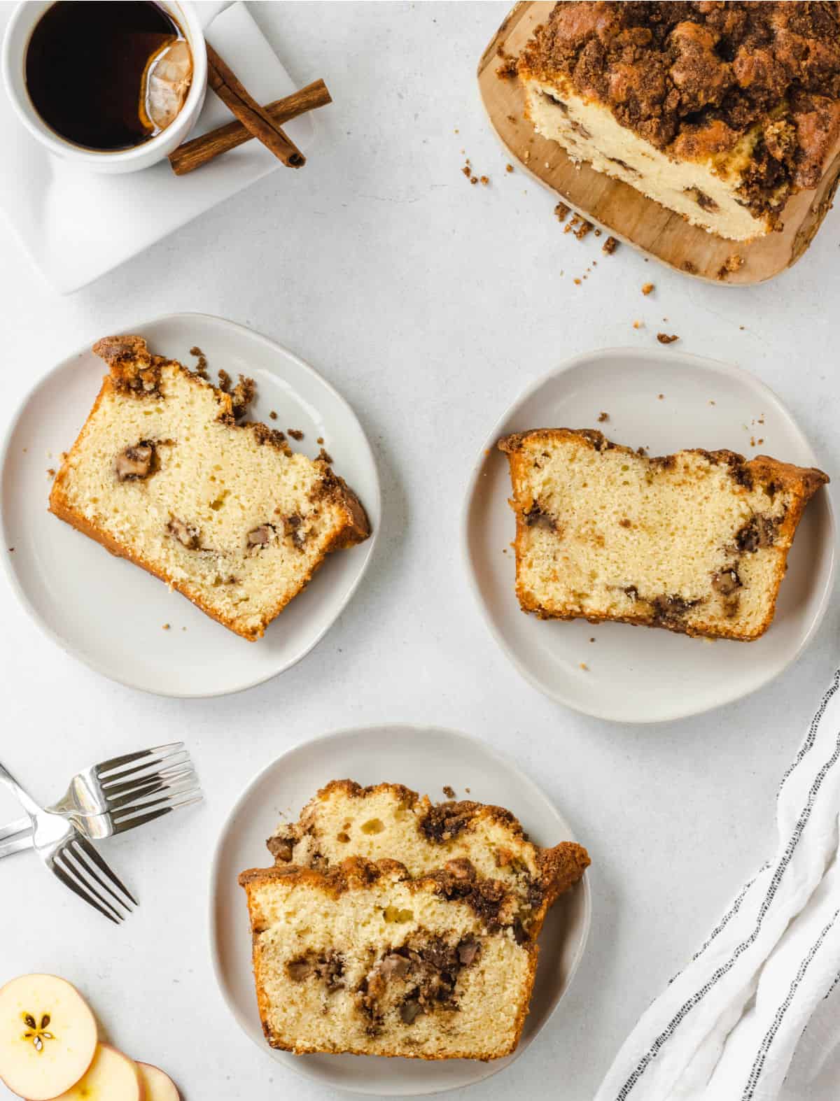 Chai spices and sweet apples baked into one delicious loaf! Chai Apple Bread is a moist, sweet and filled with real apple pieces. Bake up a loaf to fill your kitchen with a tantalizing aroma of classic fall flavors. 