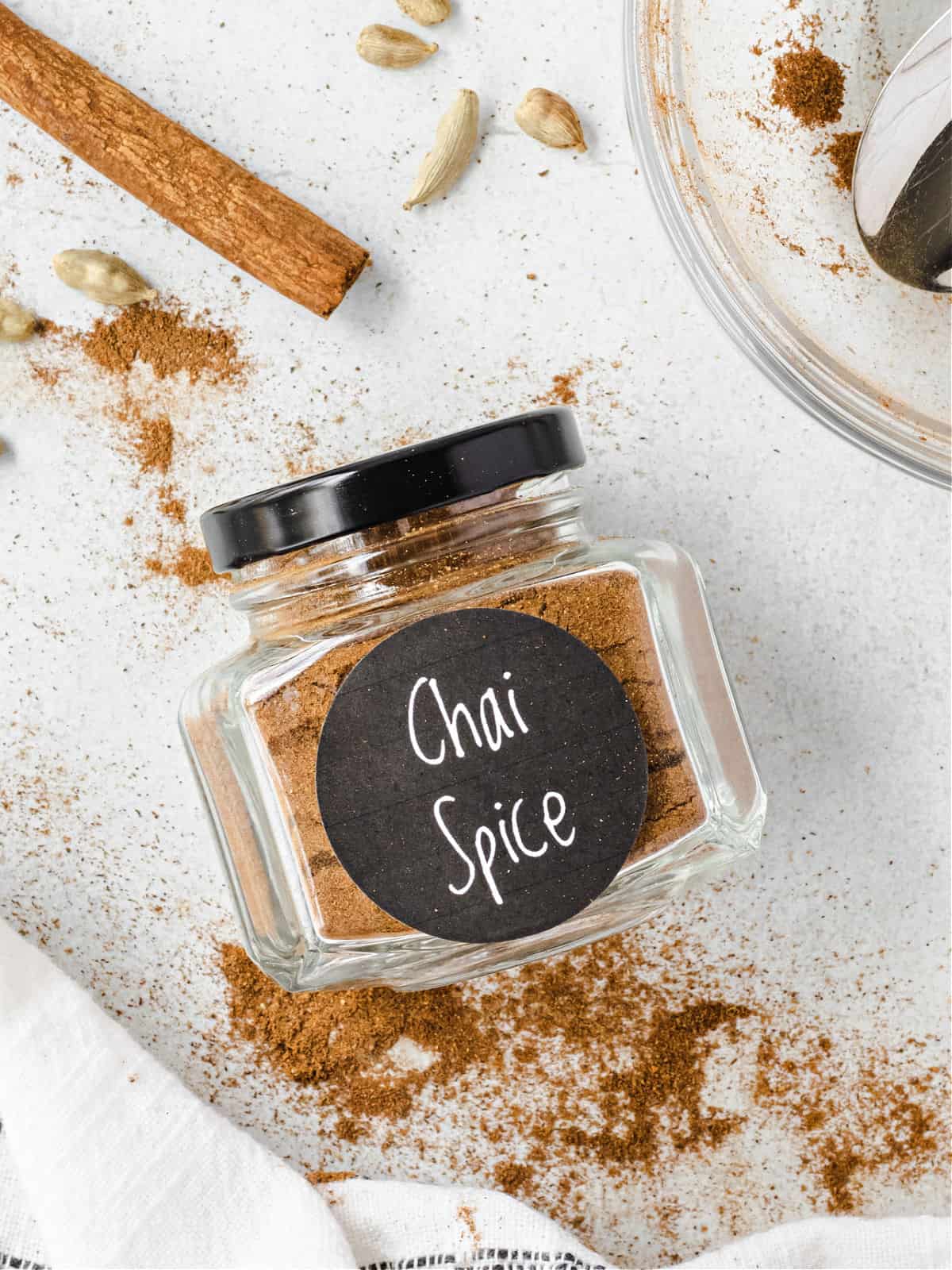 Homemade chai spice mix in a small jar.