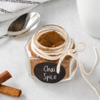 Homemade chai spices in a small jar.