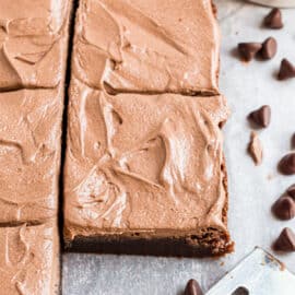 Chocolate frosted brownies cut into squares.