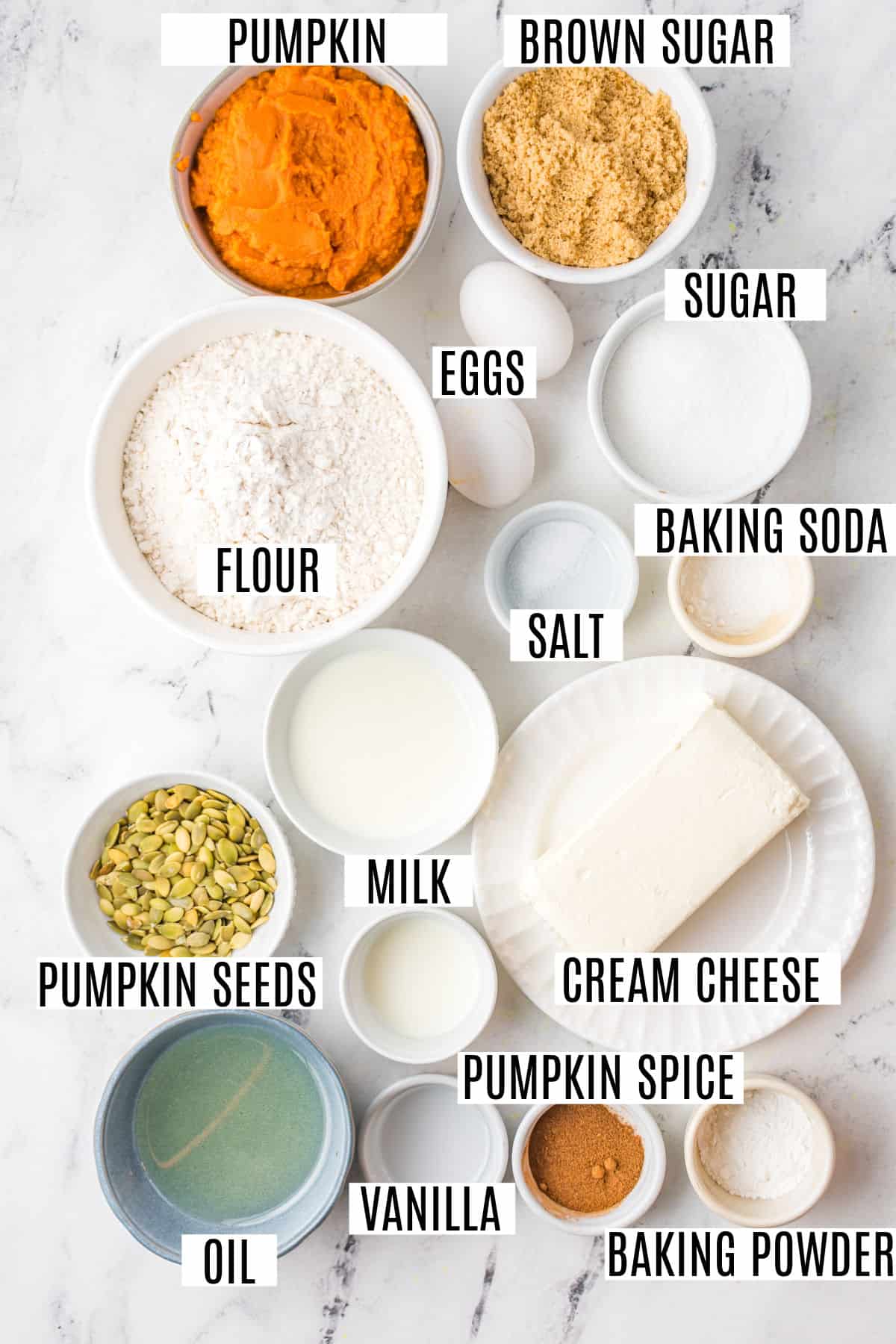 Ingredients needed for pumpkin cream cheese muffins.