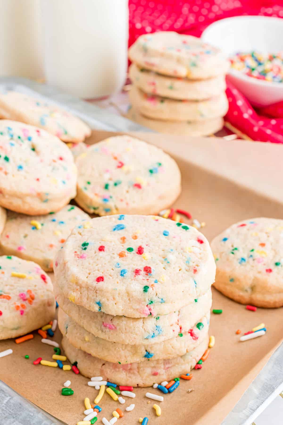 Stacks of icebox cookies on parchment paper.