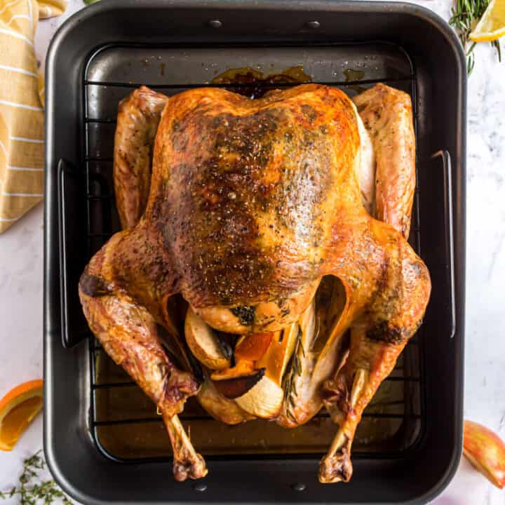 This Easy Thanksgiving Turkey recipe takes the guess work out of cooking your holiday bird. Seasoned with a simple herb butter, this turkey roasts to golden brown flavorful perfection--no basting required!