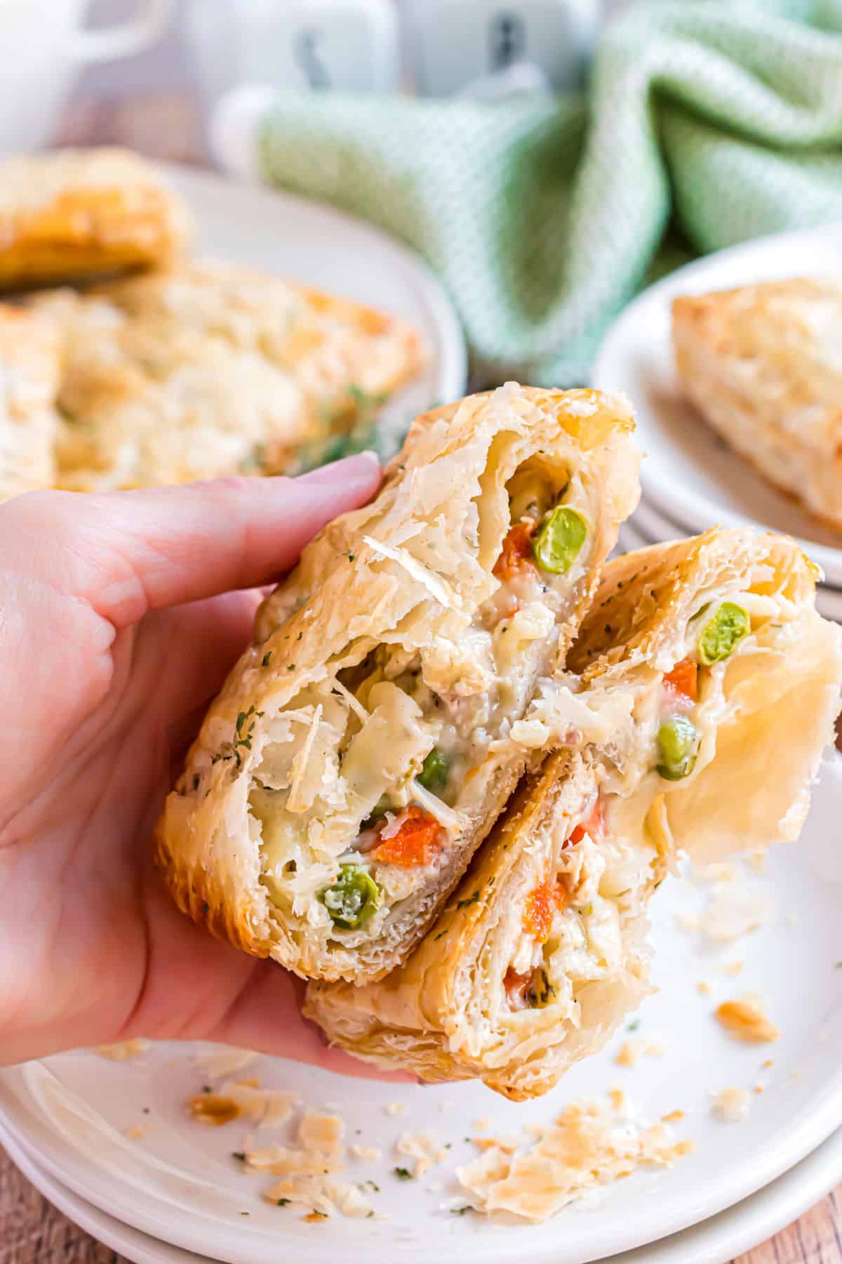 Flaky turkey hand pies cut in half.