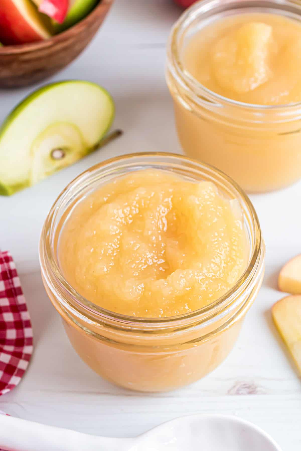 Applesauce served in mini mason jars.