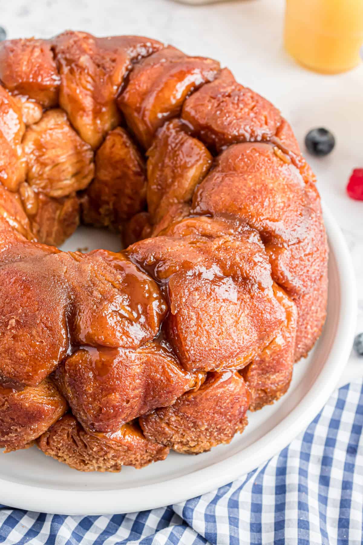 Monkey bread baked in a bundt pan with a caramel topping.