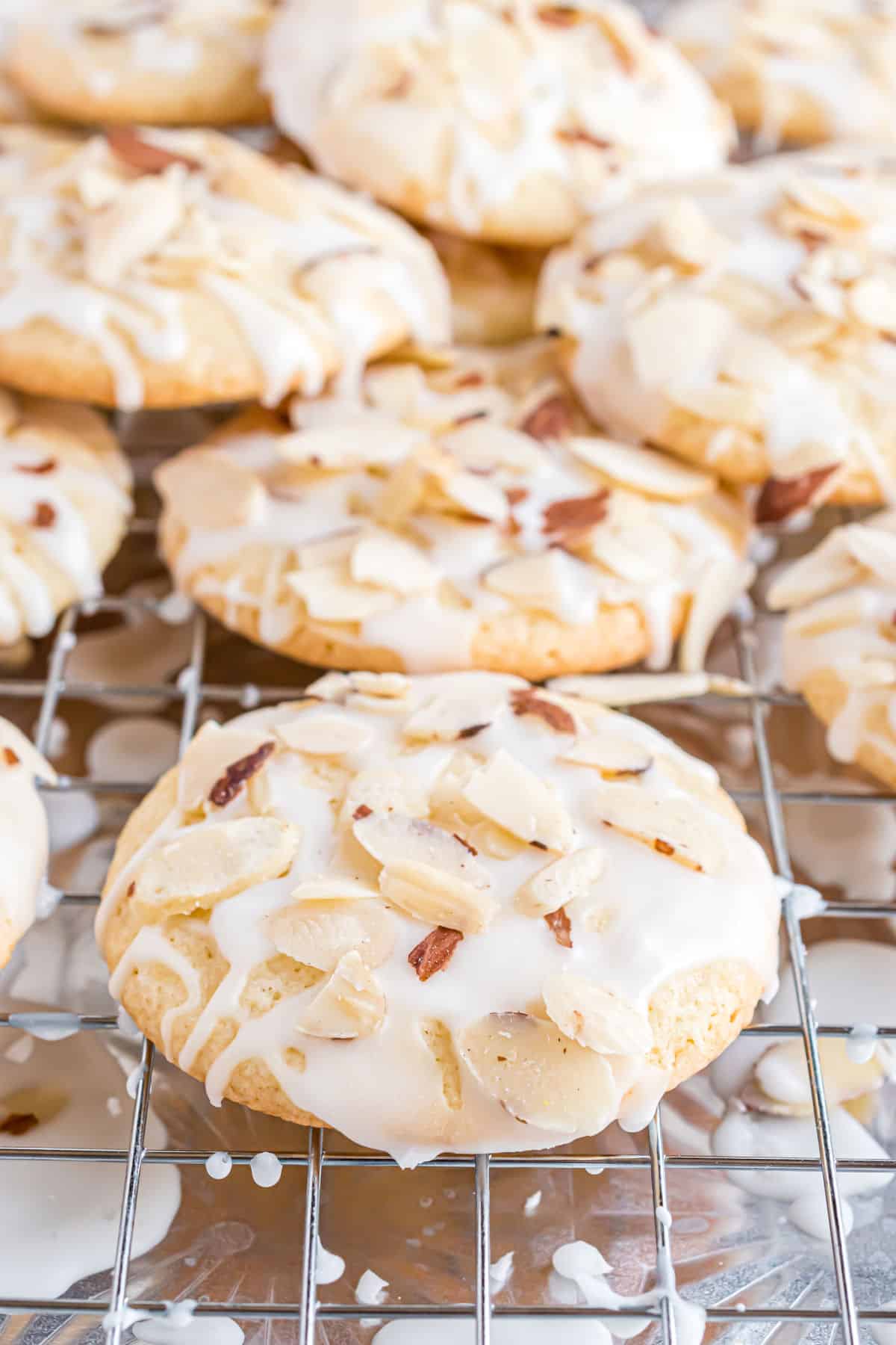 Almond cookies on a wire rack.