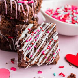 Brownie decorated with chocolate and valentine day sprinkles.