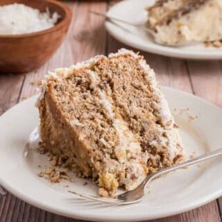 Hummingbird Cake is a moist layer cake filled with pineapple, pecans and coconut. Perfectly sweet and spiced with cinnamon, this classic southern dessert keeps everyone coming back for another slice!