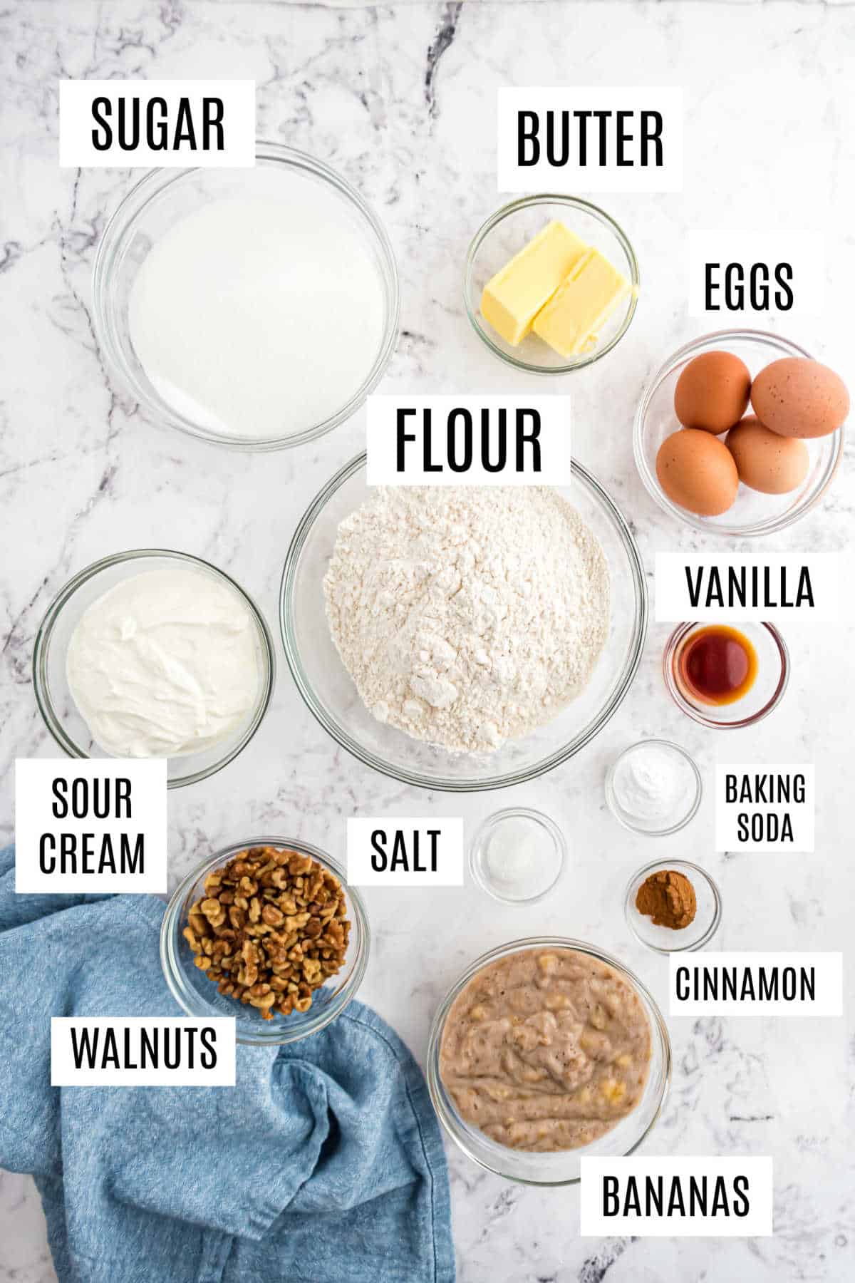 Ingredients needed to make banana nut muffins.