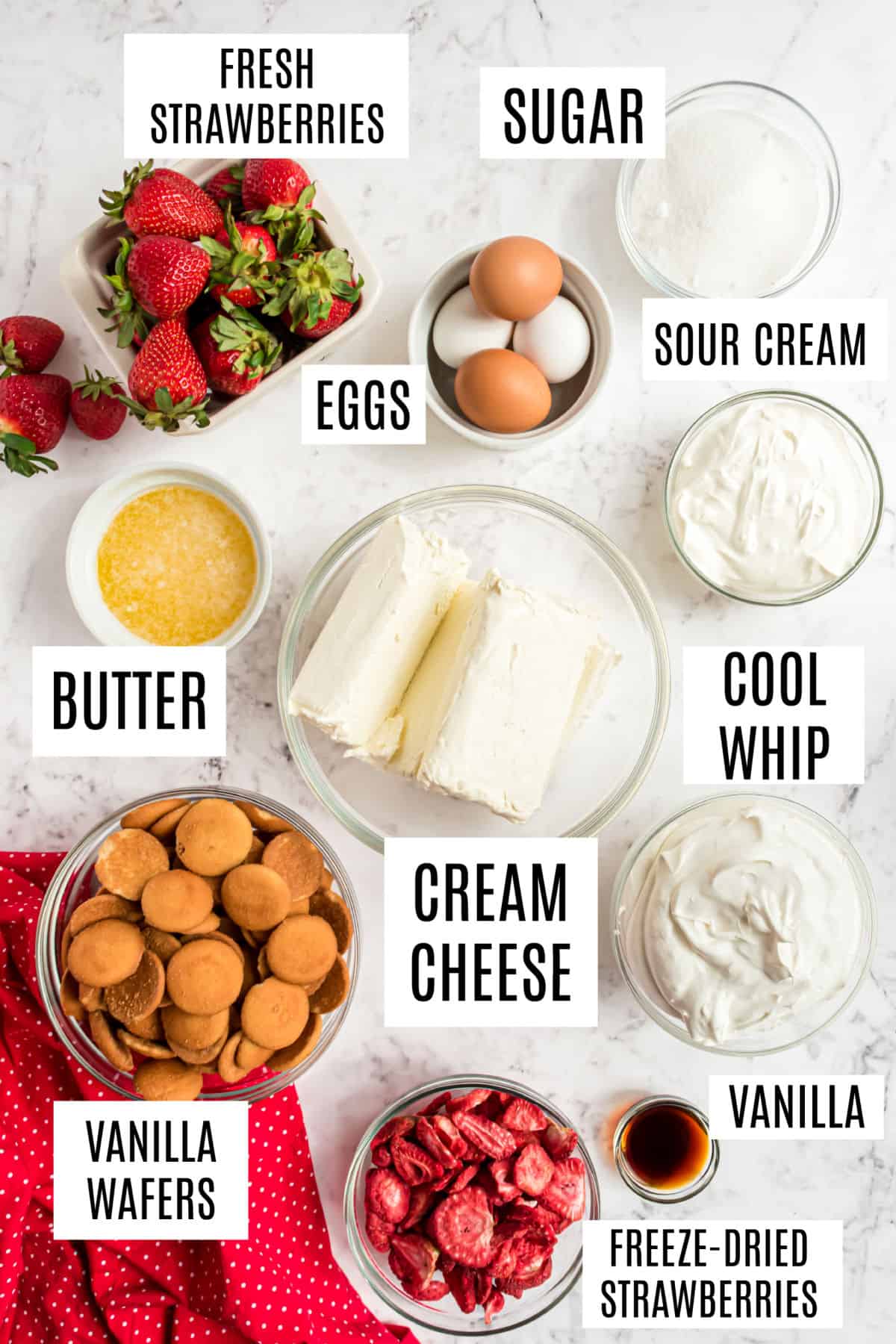 Ingredients needed to make strawberry cheesecake.