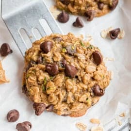 Turn your garden harvest into cookies! These Chocolate Chip Zucchini Cookies are perfectly chewy, with oats and a hint of fall spices. With plenty of semi-sweet morsels, this recipe can turn anyone into a zucchini fan.