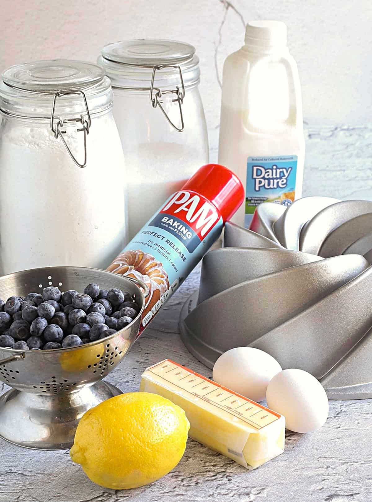 Ingredients needed to amek lemon blueberry cake.