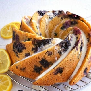 Blueberry Lemon cake on a wire cooling rack.