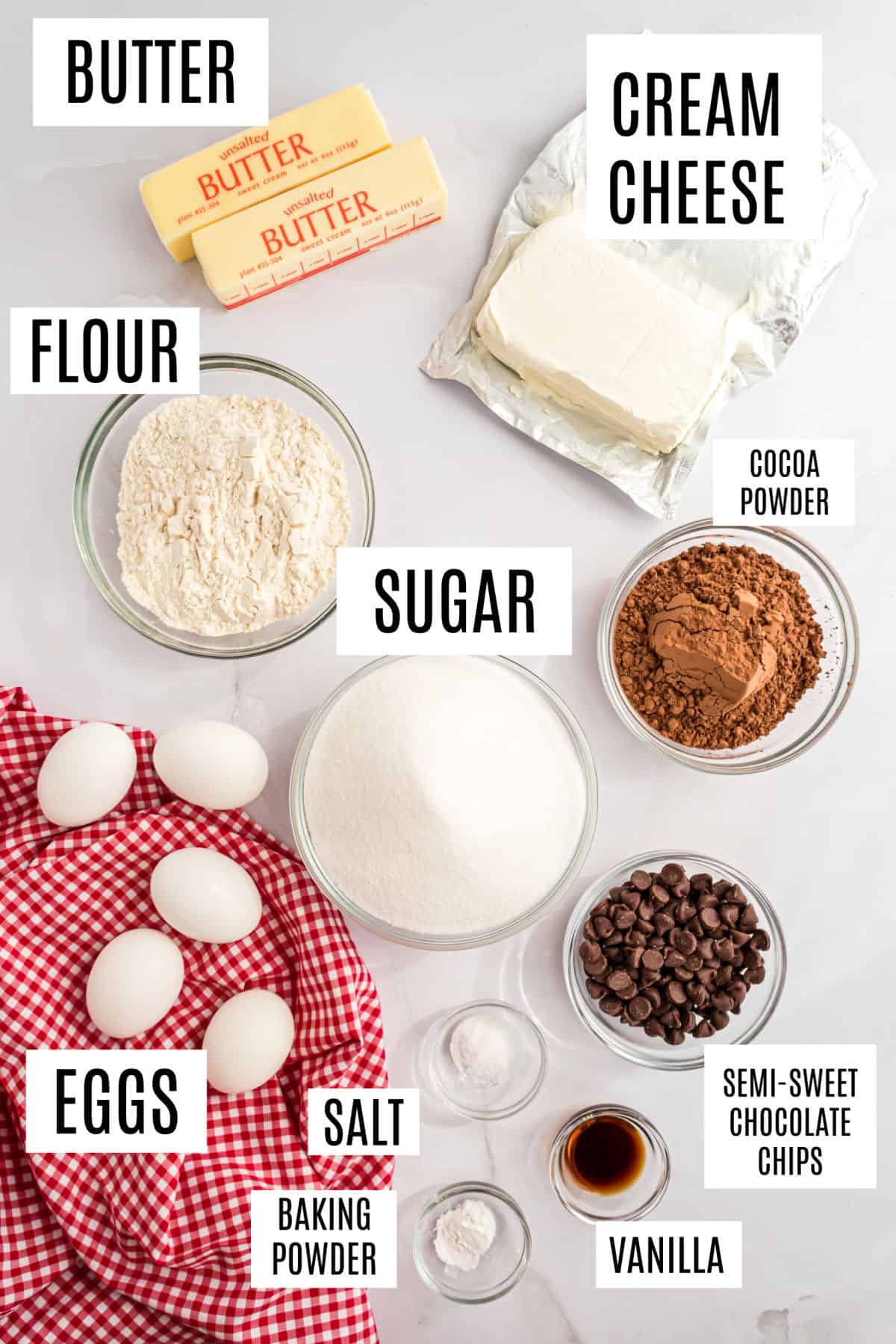 Ingredients needed to make cheesecake brownies.