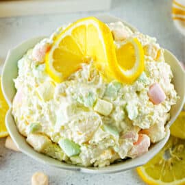 Lemon JELLO Salad deserves a spot on all your summer menus! Zesty lemon, juicy pineapple and coconut come together in an easy recipe that's perfect as a sweet side dish or chilled dessert.