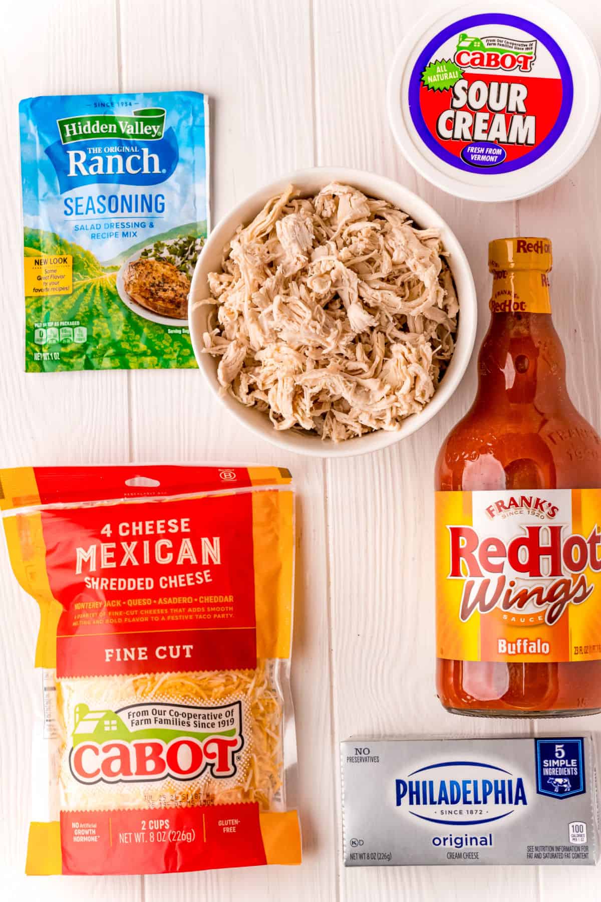 Ingredients needed to make slow cooker buffalo wing dip.