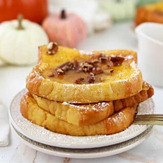 Stack of three slices of pumpkin french toast.