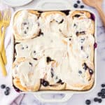 These soft Blueberry Sweet Rolls have a sugared blueberry filling and a delicious cream cheese frosting for a sweet breakfast treat that will be the highlight of your morning!