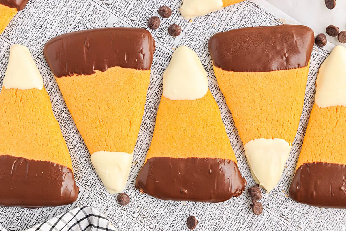 Sugar cookies dipped in chocolate to resemble candy corn.