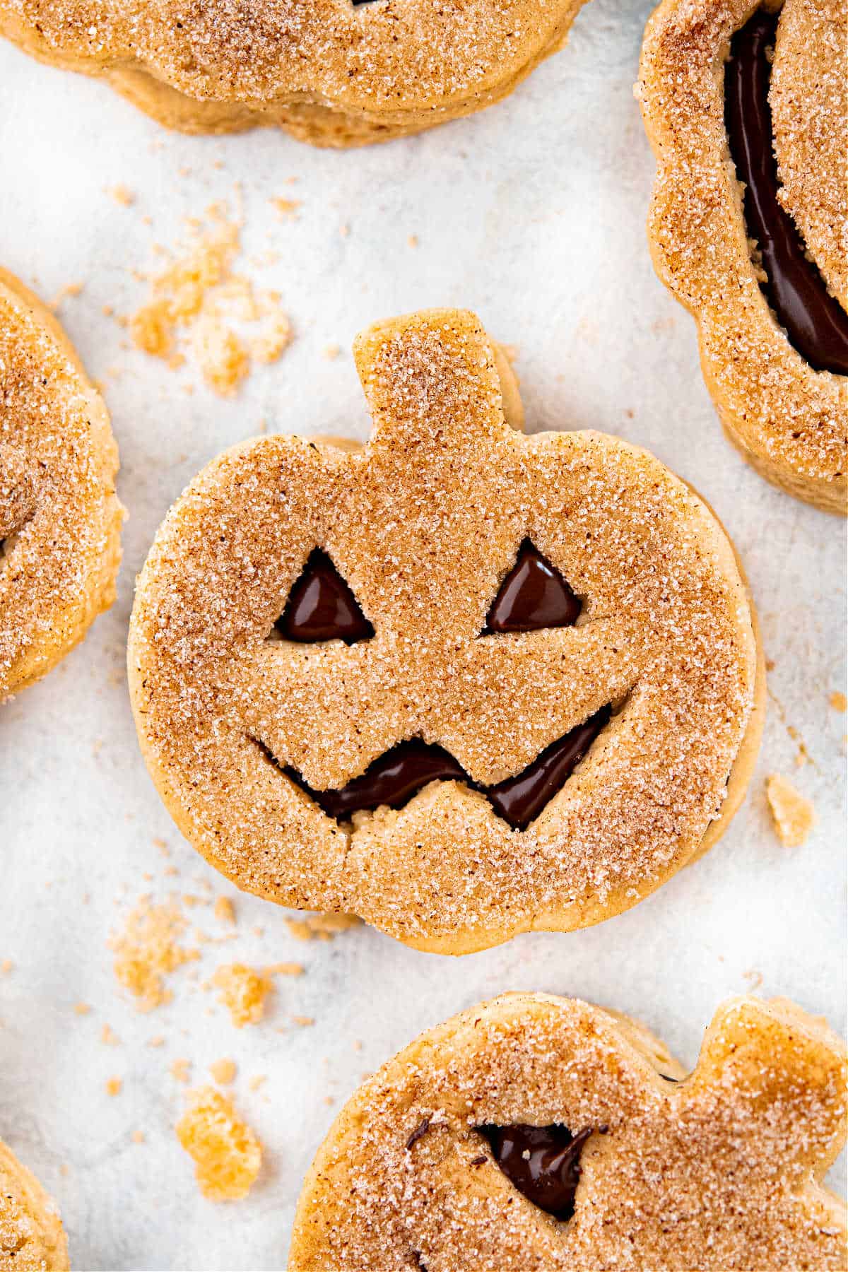 Jack O Lantern pumpkin cookie filled with chocolate.