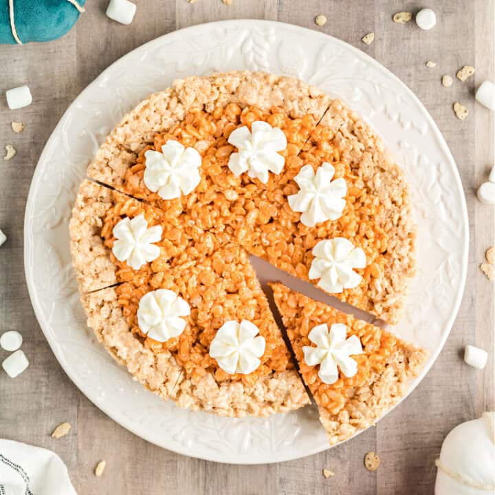 These fun Pumpkin Pie Rice Krispie Treats are perfect for fall and the holiday season! They are thick and chewy, with the just-right balance of cereal and marshmallows, plus a few tips and tricks to make them extra delicious!