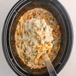 Slow Cooker Green Bean Casserole has all the classic flavors for this traditional Thanksgiving side dish, but frees up space in the oven. Make your holiday a breeze with this easy recipe!