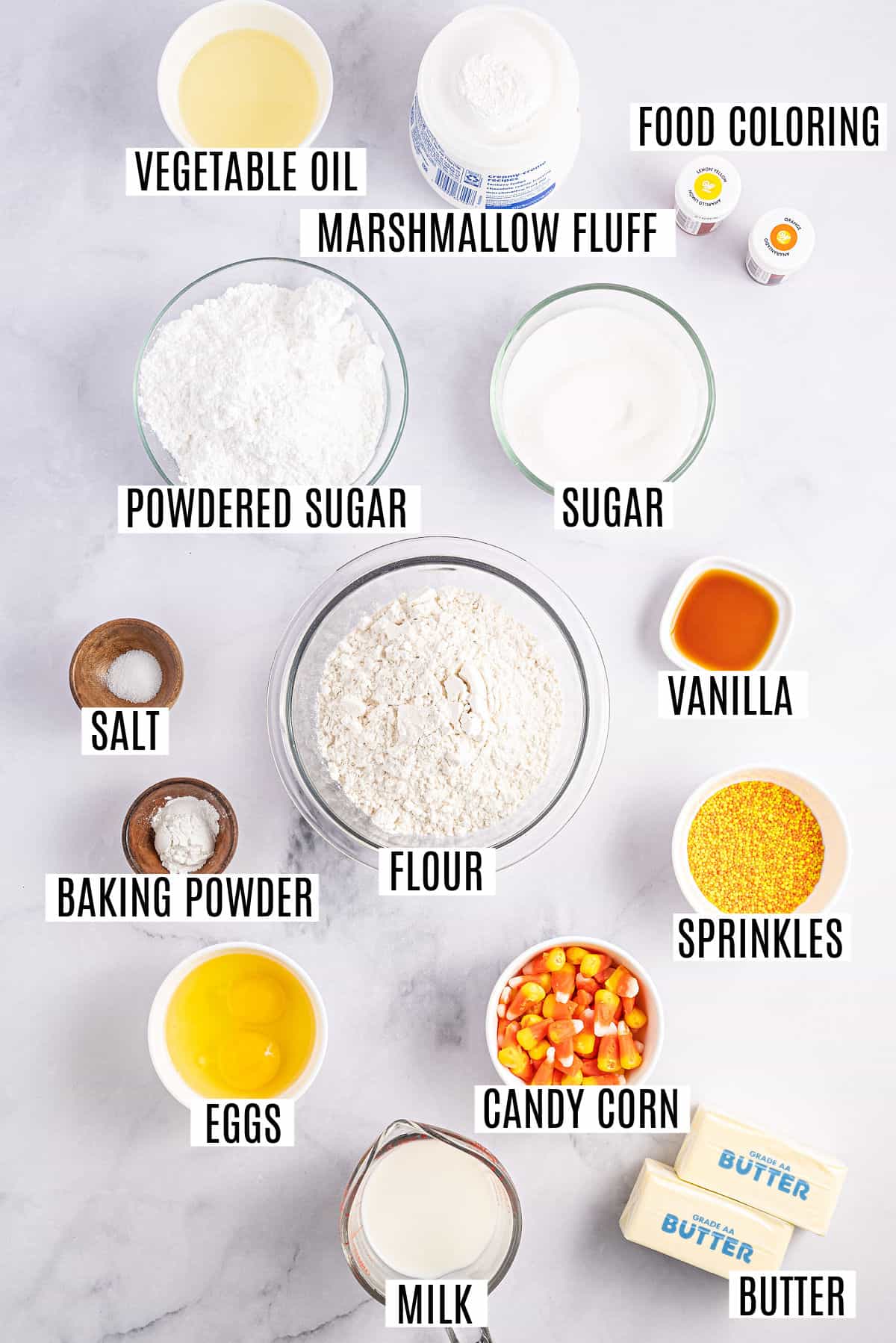 Ingredients needed to make candy corn cupcakes with marshmallow frosting.