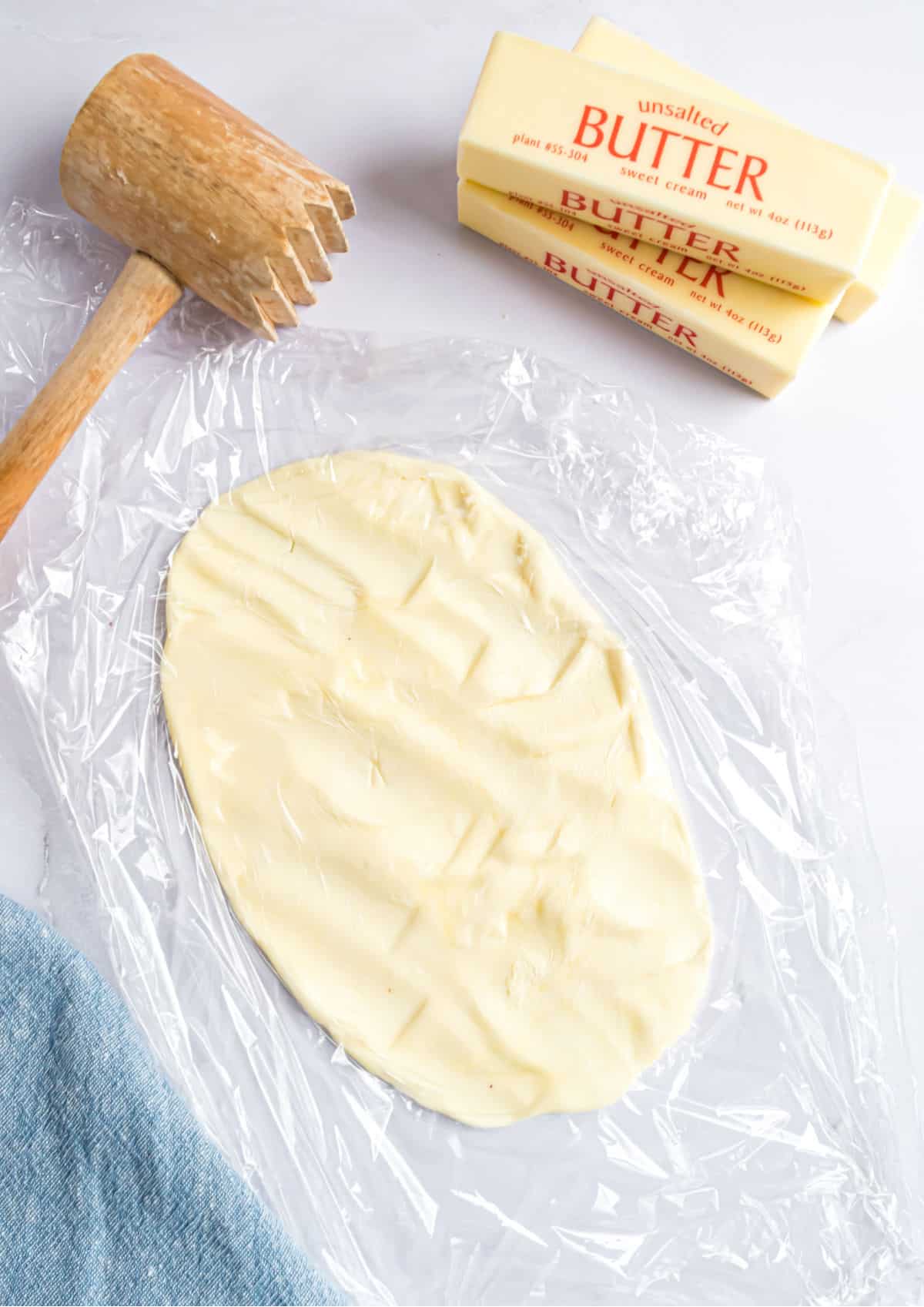 Butter pounded thin to soften quickly.