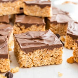 Scotheroos are chewy cereal bars with a rich peanut butter flavor and topped with melted chocolate and butterscotch. An easy no bake treat!