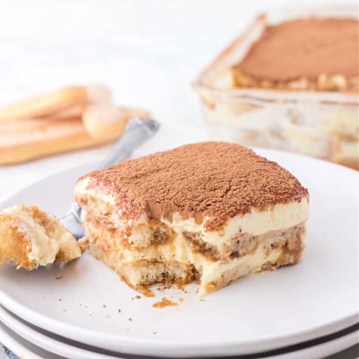 A delicious Tiramisu recipe featuring layers of espresso soaked ladyfinger cookies and mascarpone cream topped with cocoa powder for an elegant, but easy, dessert!