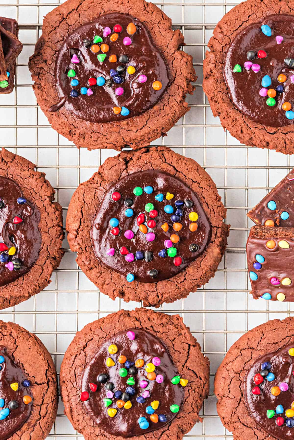 Fudgy brownie cookies on a wire cooling rack.