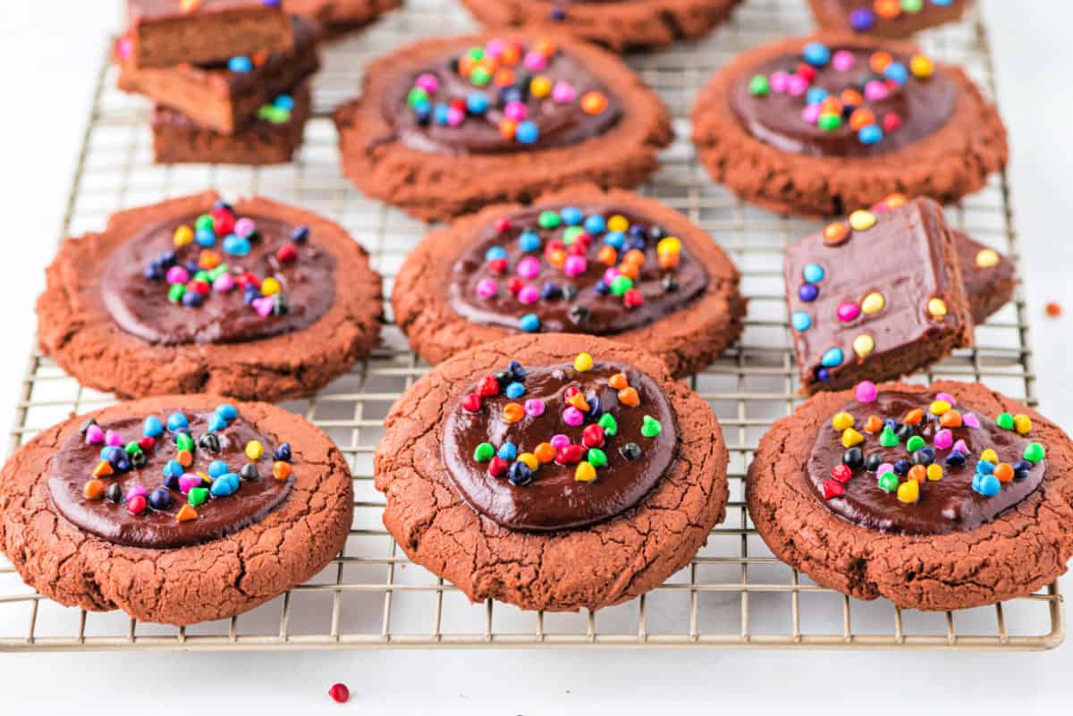 Copycat crumbl cookies on a wire cooling rack.