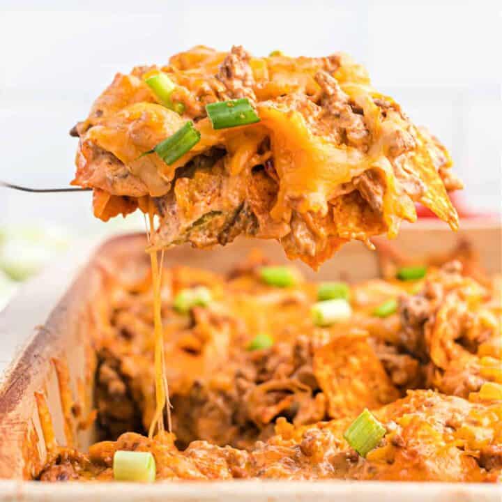Make dinner time exciting with this deliciously easy Doritos Casserole. Nacho cheese flavor meets seasoned taco meat, baked and covered with cheese! This is a family favorite meal that comes together in no time.