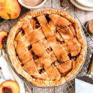 One of summertime’s best fruits is showcased in this sumptuous Peach Pie. A beautiful lattice crust encases a gently-spiced fresh peach filling. It’s ideal for picnics, potlucks, and any occasion that calls for pie. 