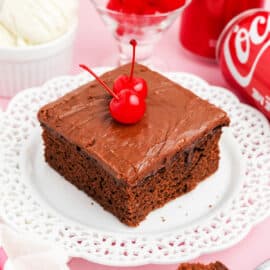 This classic Coca Cola Cake is a rich, fudgy, thick chocolate cake with deep flavor and a delicious frosting that sets up on top. It's the perfect cake to share with friends and family and serves a crowd!
