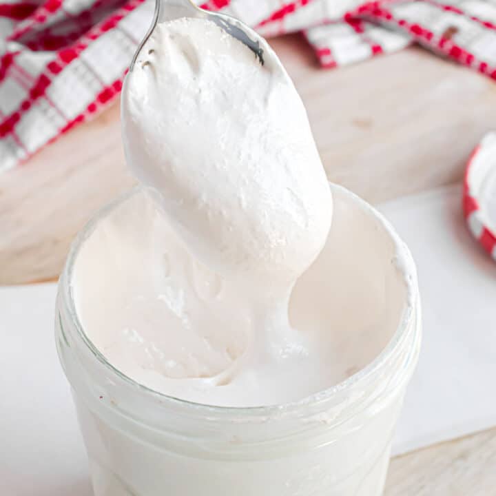 This Homemade Marshmallow Fluff is sweet, ooey, gooey, and finger-licking good. Of course, you'll want to spread it on everything, but you might finish it with a spoon! It's perfect on Fluffernutter sandwiches too!