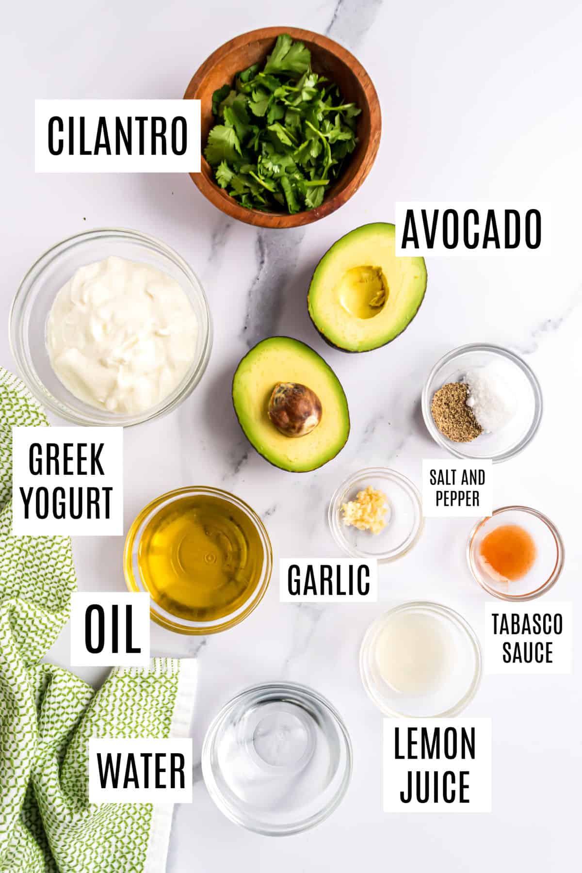 Ingredients needed to make avocado salad dressing.