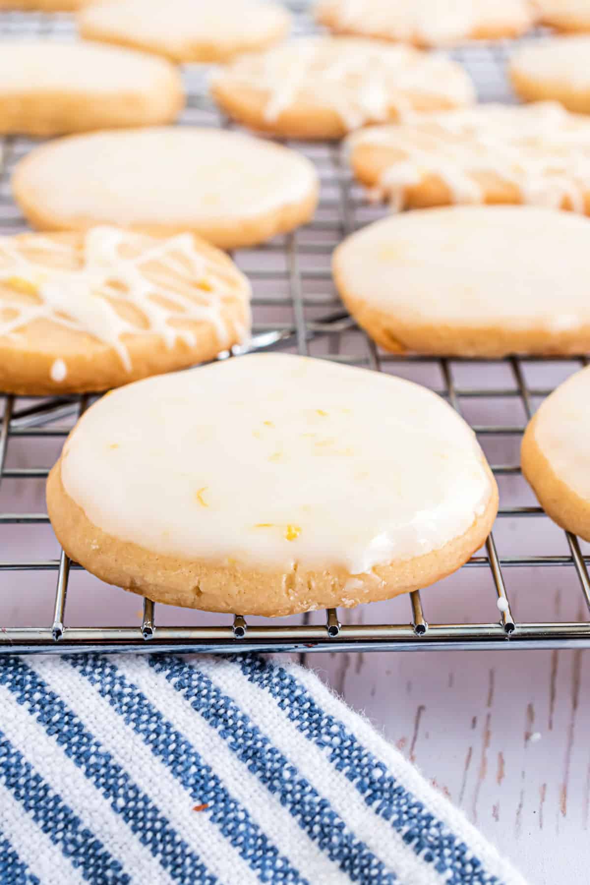 Lemon cookies on a wire cooling rack.