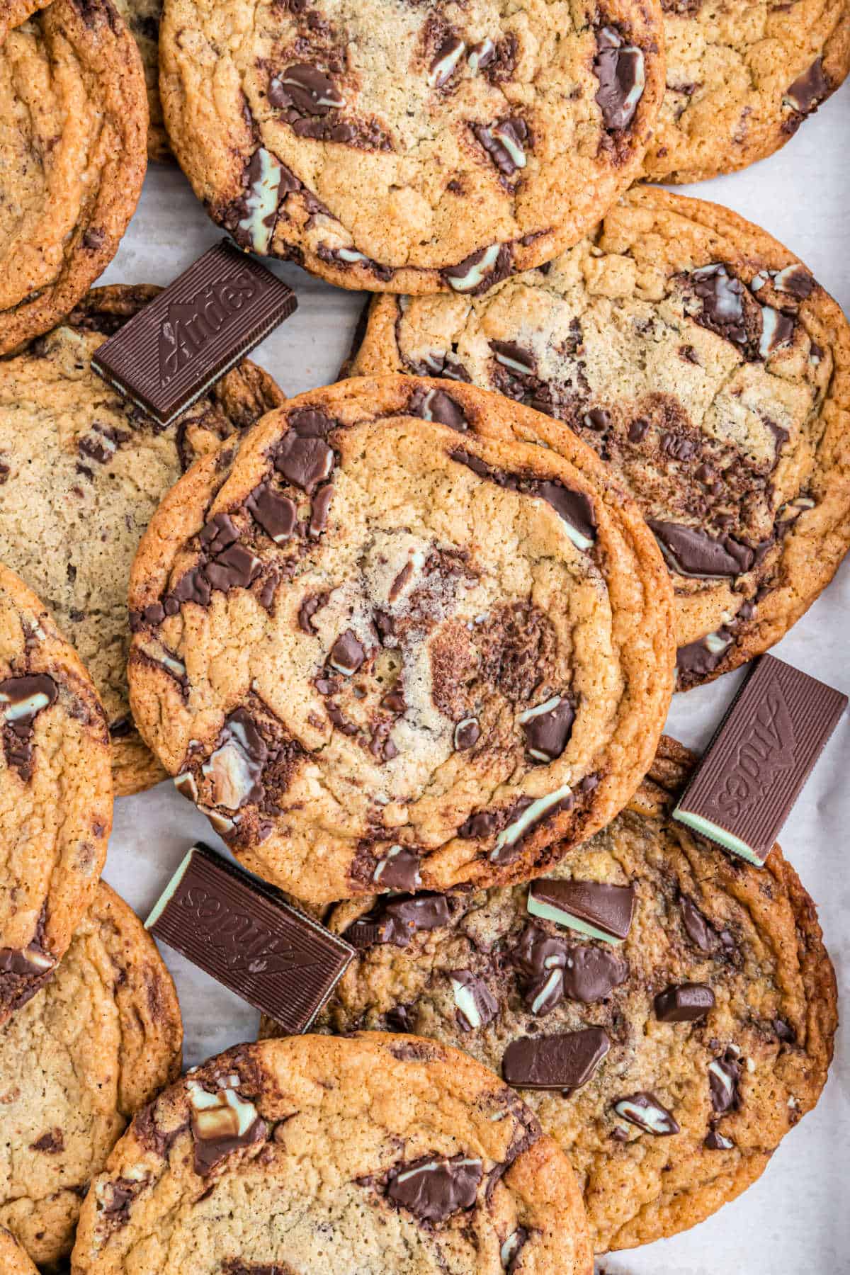 Andes cookies stacked on parchment paper.