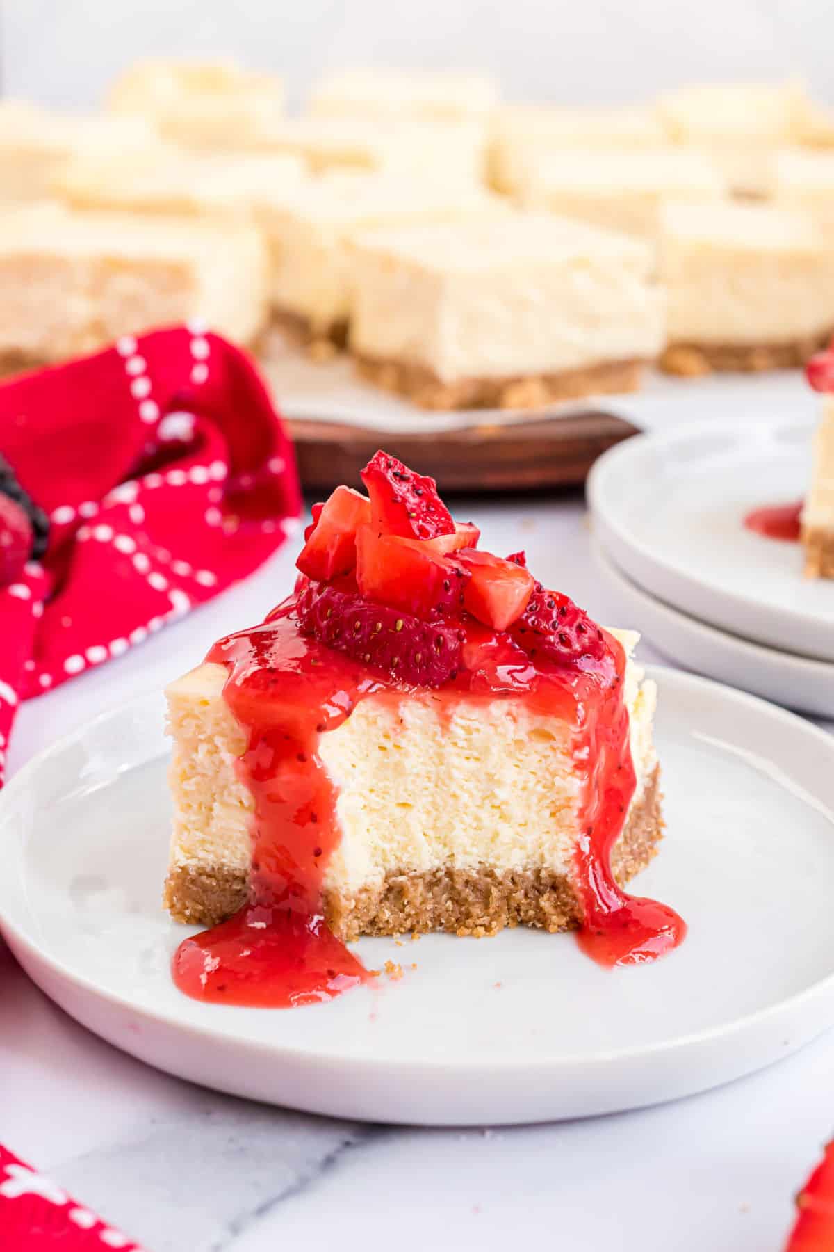Strawberry sauce on top of cheesecake.