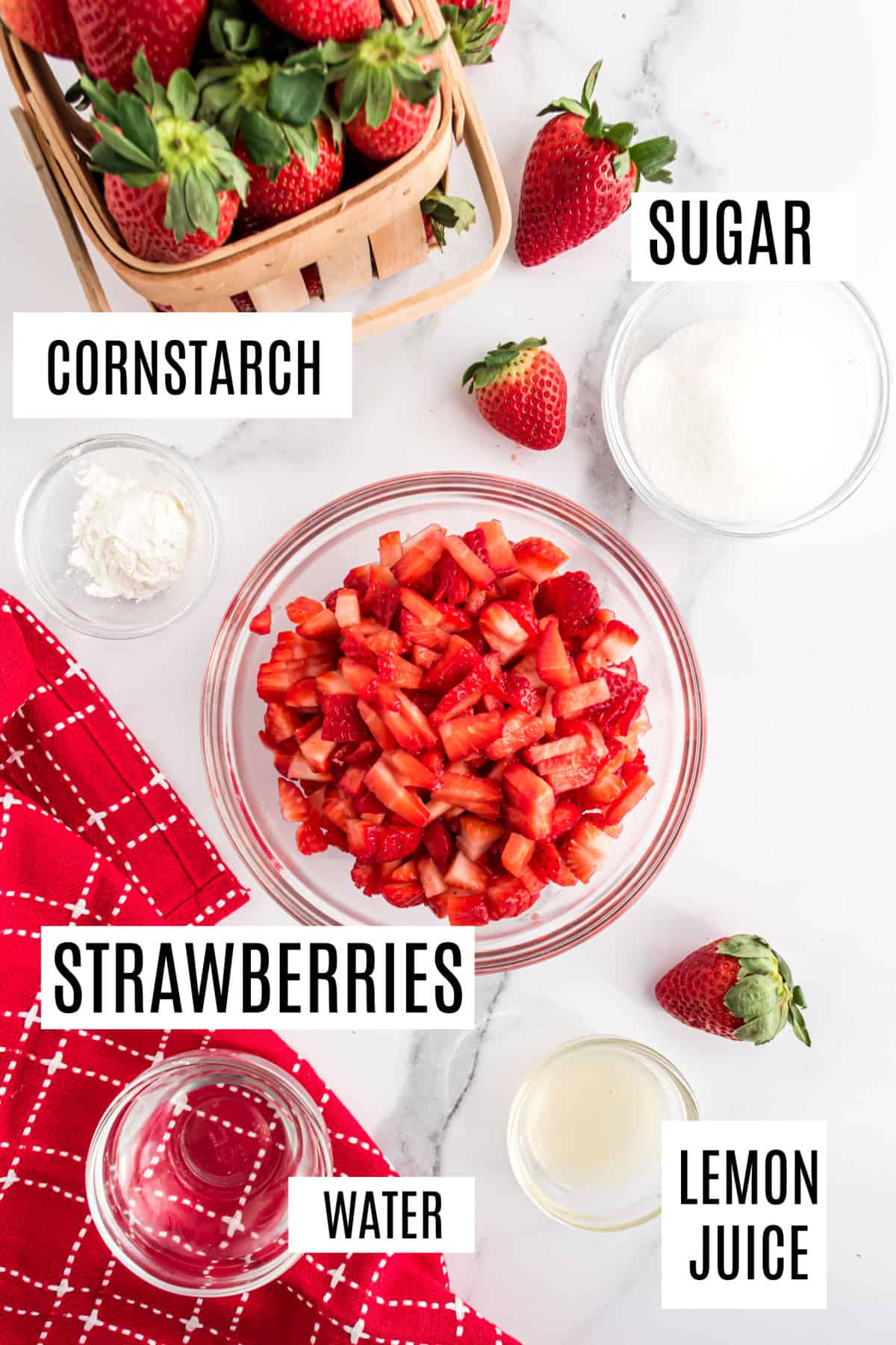 Ingredients needed to make strawberry syrup.