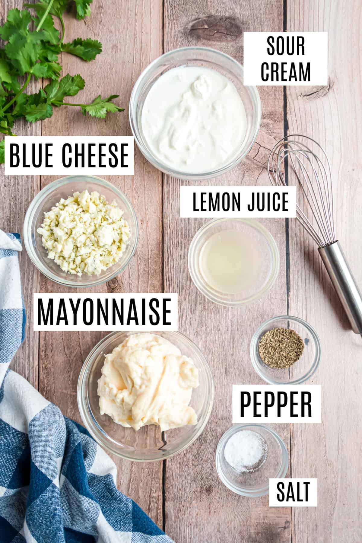 Ingredients needed to make homemade blue cheese dressing.