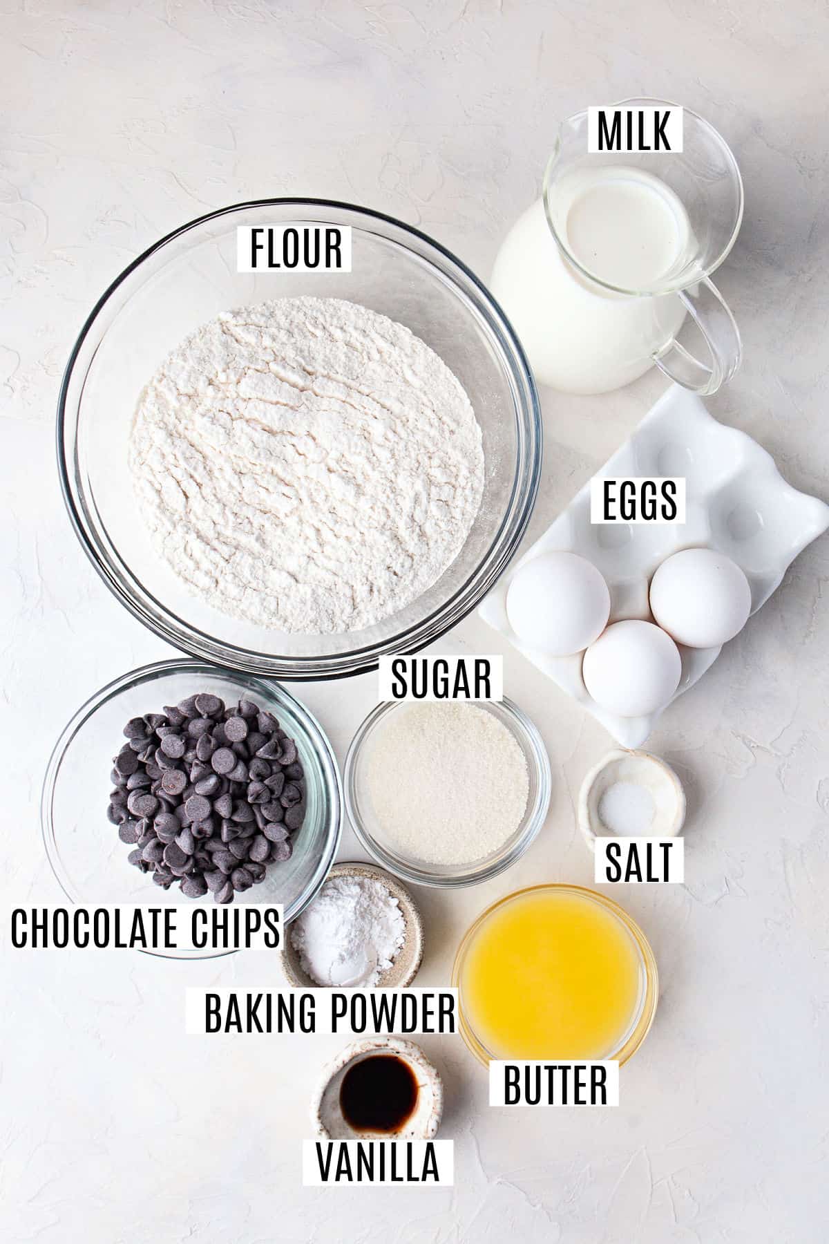 Ingredients needed to make chocolate chip waffles.