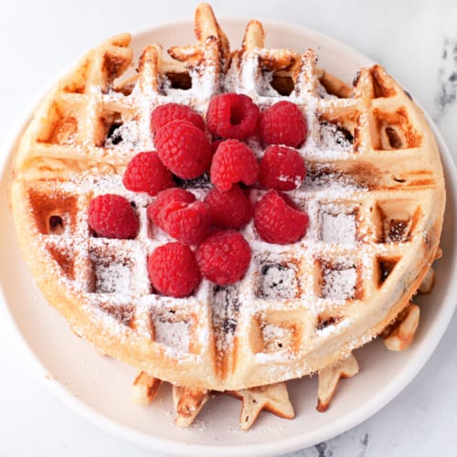 Homemade Chocolate Chip Waffles are easy to make and have buttery, crispy edges and a fluffy interior, plus plenty of chocolate chips scattered throughout. A great way to start the day!