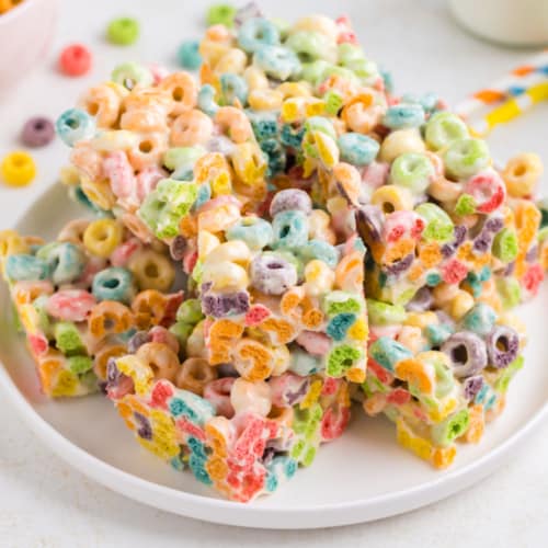 Froot Loop Treats are an easy and fun-to-make recipe. With ooey gooey marshmallows and fruity cereal, these treats are a colorful take on the classic rice krispie treats. 